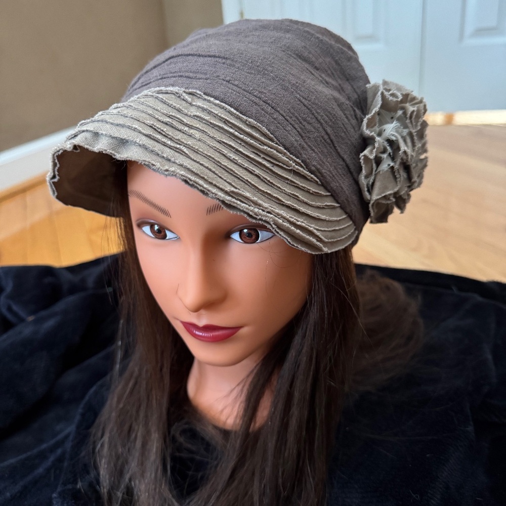 Women's brown hat with flower